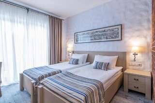 Отель AmstelSki Буковель Стандартный двухместный номер с 1 кроватью или 2 отдельными кроватями-6